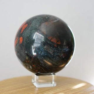Large African Bloodstone sphere with pyrite inclusions