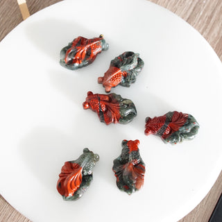 African Bloodstone Koi fish carving