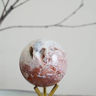 Ocean Jasper sphere with druzy pockets