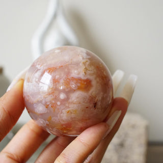 Flower agate with carnelian sphere