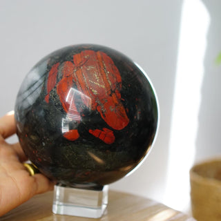 Large African Bloodstone sphere with pyrite inclusions
